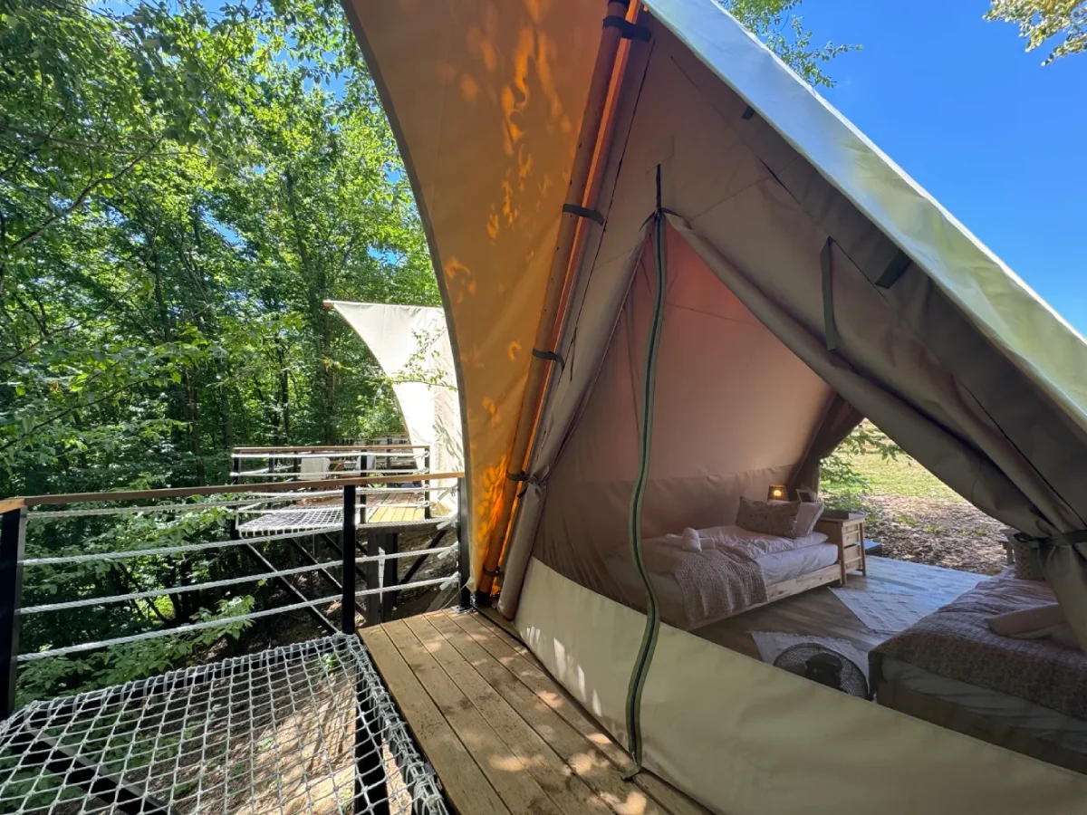 Bedroom inside compact glamping tent