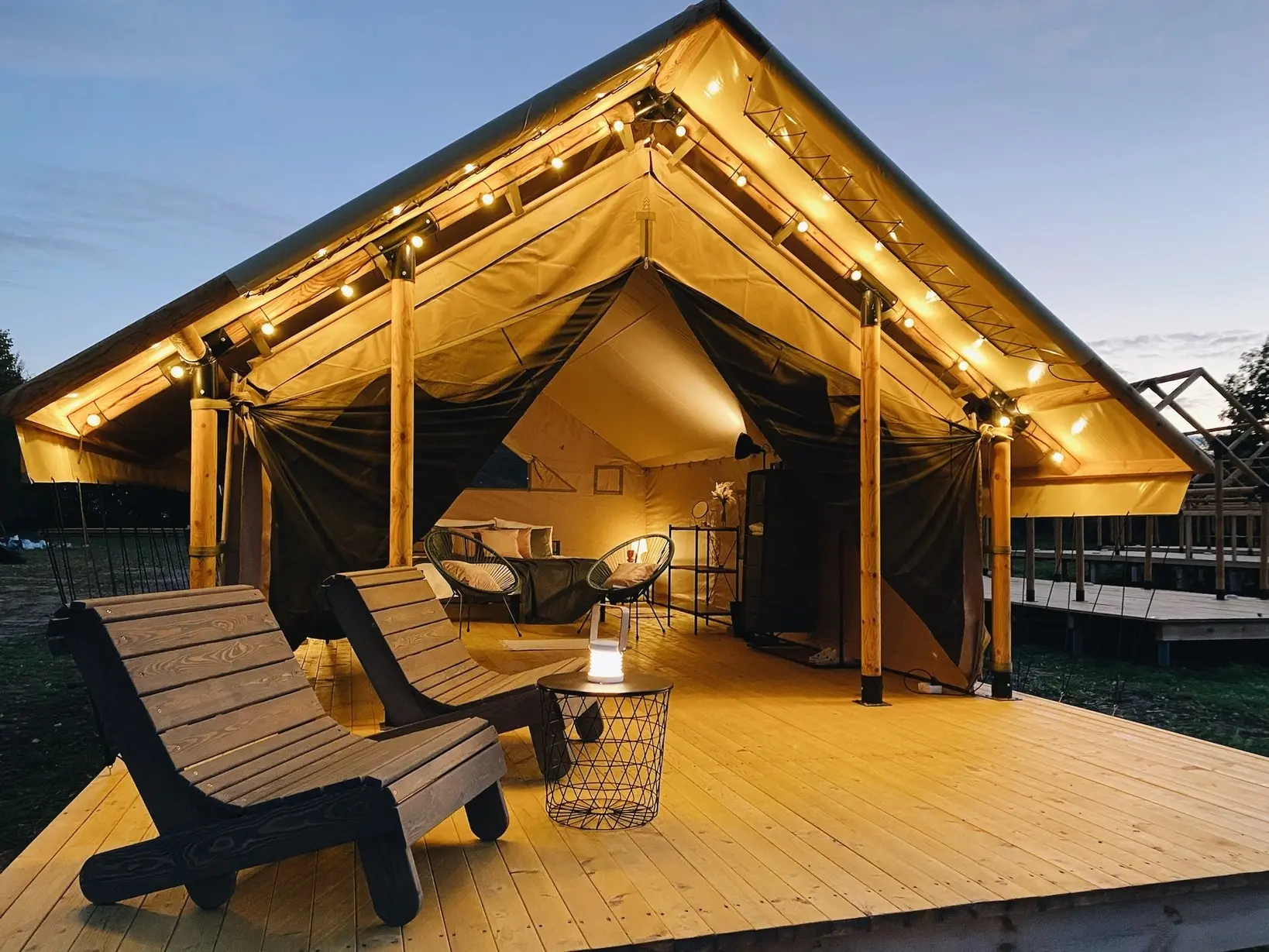 Covered terrace on a safari glamping tent