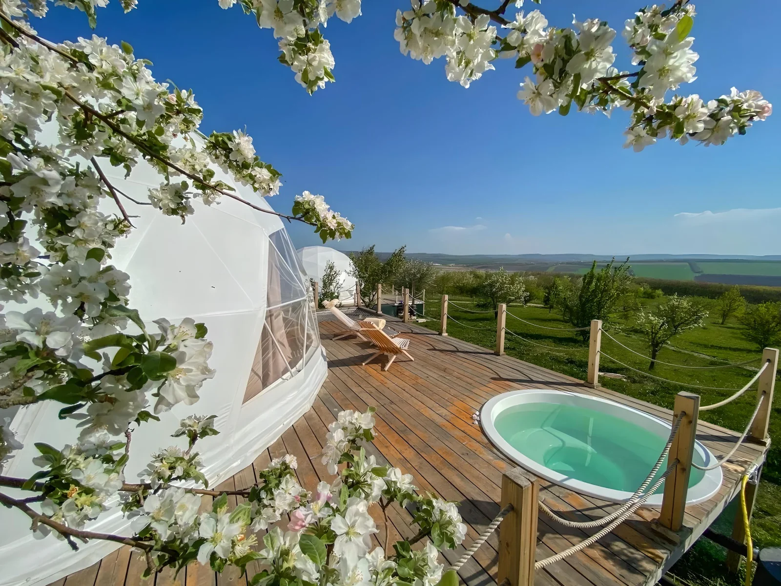 Luxury dome with hot tub on wooden platform