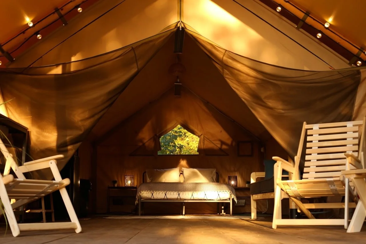 Open interior of a safari glamping tent