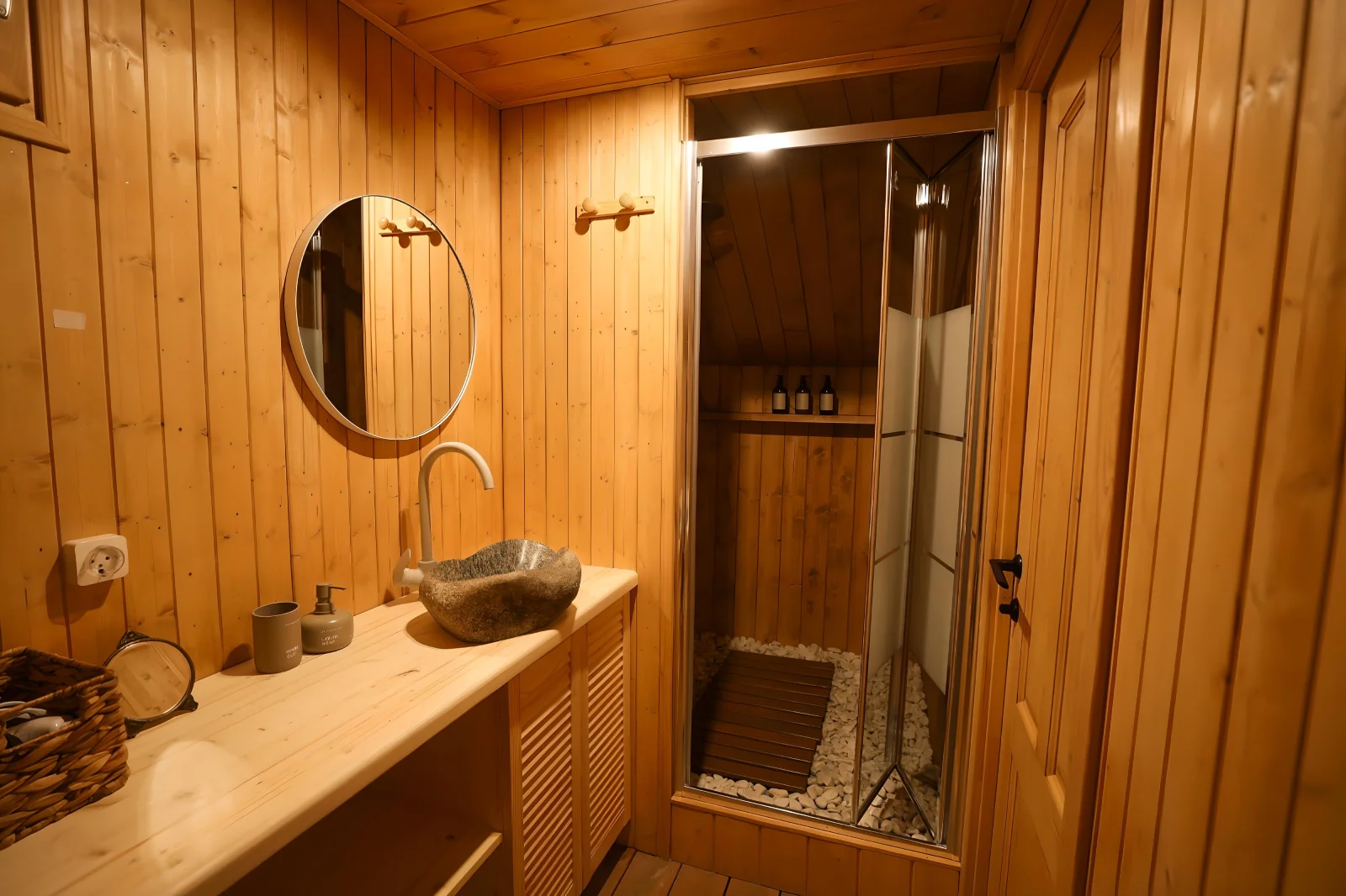 Wood-finished private bathroom inside a Wildhomes Safari tent