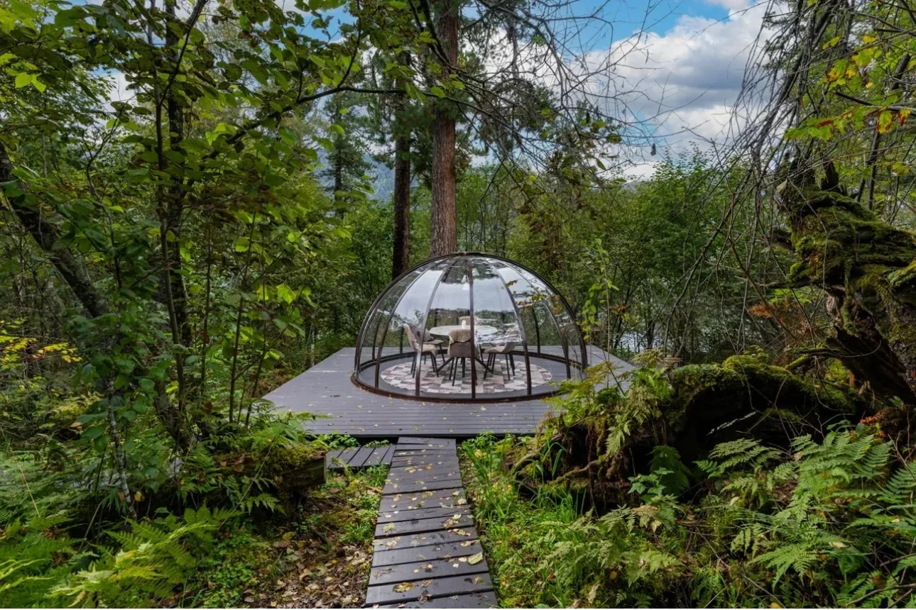 Custom hospitality pavilion integrated into a premium glamping project in nature