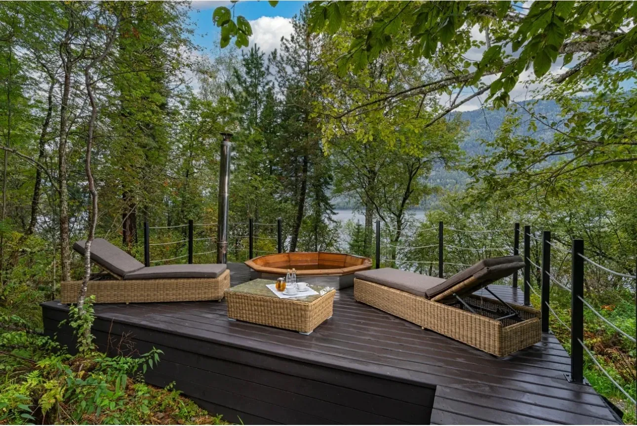 Private outdoor terrace for premium glamping accommodation surrounded by nature